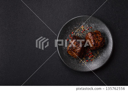 Grilled or barbecued beef steak, a fillet of meat cooked for dinner. Beef steak Grilled or barbecued beef steak, a fillet of meat cooked for dinner. Beef steak 135762556