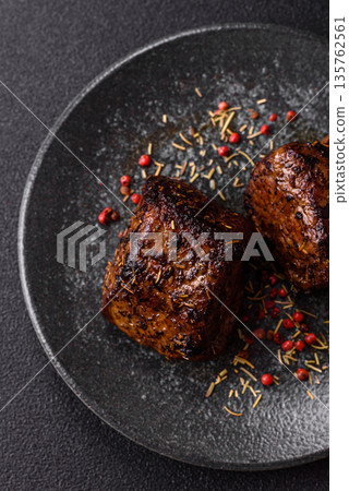 Grilled or barbecued beef steak, a fillet of meat cooked for dinner. Beef steak Grilled or barbecued beef steak, a fillet of meat cooked for dinner. Beef steak 135762561