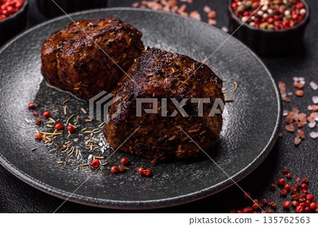 Grilled or barbecued beef steak, a fillet of meat cooked for dinner. Beef steak Grilled or barbecued beef steak, a fillet of meat cooked for dinner. Beef steak 135762563