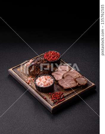 Grilled or barbecued beef steak, a fillet of meat cooked for dinner. Beef steak Grilled or barbecued beef steak, a fillet of meat cooked for dinner. Beef steak 135762585