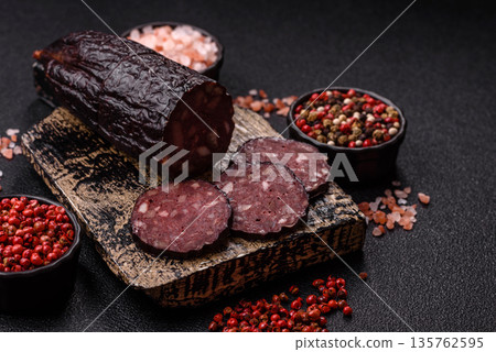 Black blood pudding, grilled pork sausage cooked for dinner. Blood pudding Black blood pudding, grilled pork sausage cooked for dinner. Blood pudding 135762595
