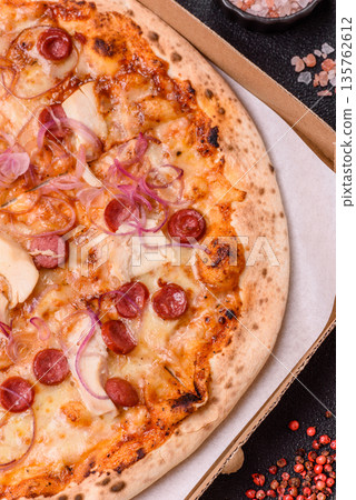 Italian pizza with sausage, chicken, and cheese for dinner. Sausage pizza 135762612