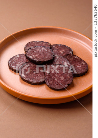 Black blood pudding, grilled pork sausage cooked for dinner. Blood pudding 135762640
