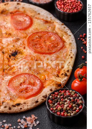 Vegetarian Margherita pizza with tomato, cheese, and sauce, for dinner. Margherita pizza 135762657
