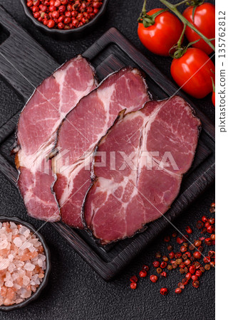 Meat, smoked ham, or pork sausage sliced for breakfast sandwiches. Sliced ham Meat, smoked ham, or pork sausage sliced for breakfast sandwiches. Sliced ham 135762812