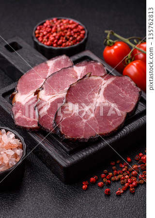 Meat, smoked ham, or pork sausage sliced for breakfast sandwiches. Sliced ham Meat, smoked ham, or pork sausage sliced for breakfast sandwiches. Sliced ham 135762813