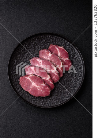 Meat, smoked ham, or pork sausage sliced for breakfast sandwiches. Sliced ham Meat, smoked ham, or pork sausage sliced for breakfast sandwiches. Sliced ham 135762820