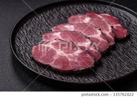 Meat, smoked ham, or pork sausage sliced for breakfast sandwiches. Sliced ham Meat, smoked ham, or pork sausage sliced for breakfast sandwiches. Sliced ham 135762822
