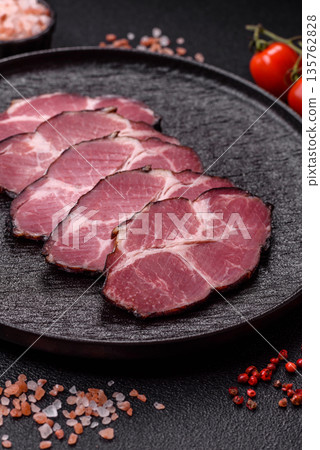 Meat, smoked ham, or pork sausage sliced for breakfast sandwiches. Sliced ham Meat, smoked ham, or pork sausage sliced for breakfast sandwiches. Sliced ham 135762828