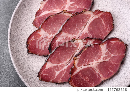 Meat, smoked ham, or pork sausage sliced for breakfast sandwiches. Sliced ham Meat, smoked ham, or pork sausage sliced for breakfast sandwiches. Sliced ham 135762838