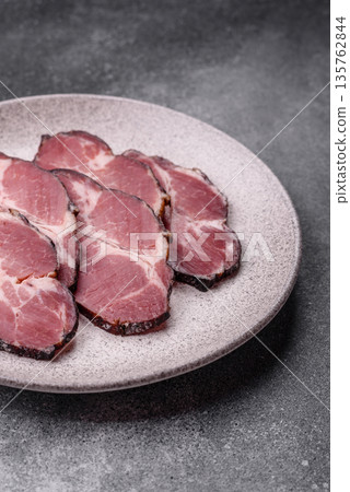 Meat, smoked ham, or pork sausage sliced for breakfast sandwiches. Sliced ham 135762844