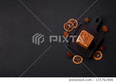 A French cube croissant with chocolate filling, a sweet breakfast pastry. Cube croissant A French cube croissant with chocolate filling, a sweet breakfast pastry. Cube croissant 135762906