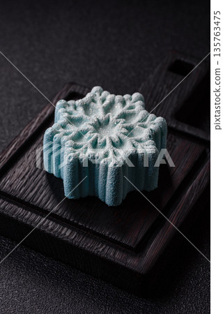 Christmas mochi, mooncake, or cheesecake shaped like a snowflake. Christmas mochi or cheesecake Christmas mochi, mooncake, or cheesecake shaped like a snowflake. Christmas mochi or cheesecake 135763475