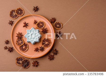 Christmas mochi, mooncake, or cheesecake shaped like a snowflake. Christmas mochi or cheesecake 135763496