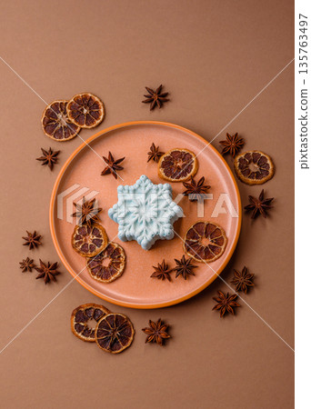 Christmas mochi, mooncake, or cheesecake shaped like a snowflake. Christmas mochi or cheesecake 135763497