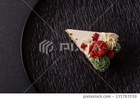 A slice of sweet layered cake with white cream for a birthday or holiday. A slice of cake A slice of sweet layered cake with white cream for a birthday or holiday. A slice of cake 135763550