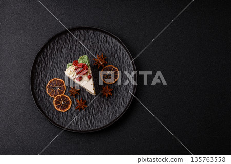 A slice of sweet layered cake with white cream for a birthday or holiday. A slice of cake A slice of sweet layered cake with white cream for a birthday or holiday. A slice of cake 135763558