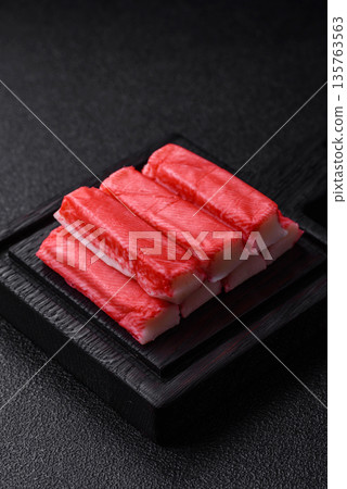 Fresh crab sticks for making a dinner salad. Crab sticks Fresh crab sticks for making a dinner salad. Crab sticks 135763563