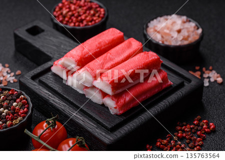 Fresh crab sticks for making a dinner salad. Crab sticks Fresh crab sticks for making a dinner salad. Crab sticks 135763564