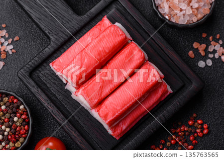Fresh crab sticks for making a dinner salad. Crab sticks Fresh crab sticks for making a dinner salad. Crab sticks 135763565