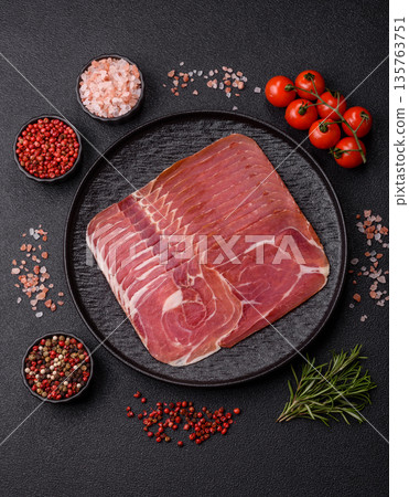 Meat, ham, jamon, or prosciutto sliced for breakfast bruschetta. Sliced ham, jamon, or prosciutto Meat, ham, jamon, or prosciutto sliced for breakfast bruschetta. Sliced ham, jamon, or prosciutto 135763751