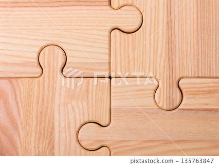 A wooden empty puzzle piece for a sign or business concept. A wooden empty puzzle A wooden empty puzzle piece for a sign or business concept. A wooden empty puzzle 135763847