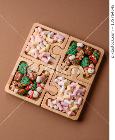 Mini marshmallows in white, pink, and pastel colors. Marshmallows as a food background Mini marshmallows in white, pink, and pastel colors. Marshmallows as a food background 135764048