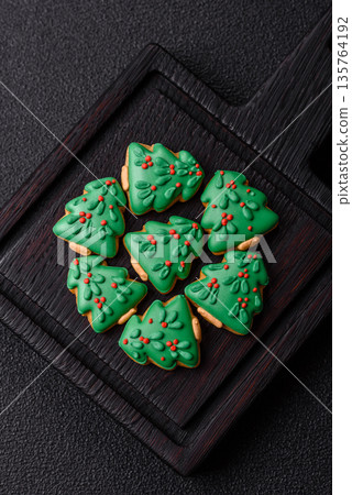 Gingerbread, Christmas cookies, and ornamental holiday baked goods. Christmas gingerbread Gingerbread, Christmas cookies, and ornamental holiday baked goods. Christmas gingerbread 135764192