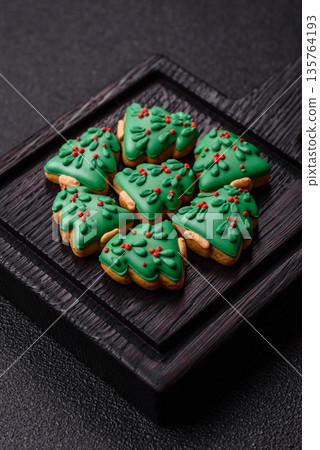 Gingerbread, Christmas cookies, and ornamental holiday baked goods. Christmas gingerbread Gingerbread, Christmas cookies, and ornamental holiday baked goods. Christmas gingerbread 135764193