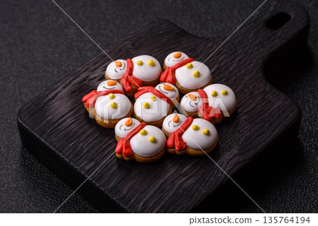 Gingerbread, Christmas cookies, and ornamental holiday baked goods. Christmas gingerbread Gingerbread, Christmas cookies, and ornamental holiday baked goods. Christmas gingerbread 135764194