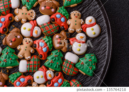 Gingerbread, Christmas cookies, and ornamental holiday baked goods. Christmas gingerbread Gingerbread, Christmas cookies, and ornamental holiday baked goods. Christmas gingerbread 135764218