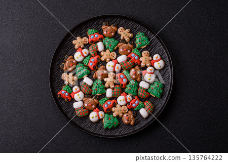 Gingerbread, Christmas cookies, and ornamental holiday baked goods. Christmas gingerbread Gingerbread, Christmas cookies, and ornamental holiday baked goods. Christmas gingerbread 135764222
