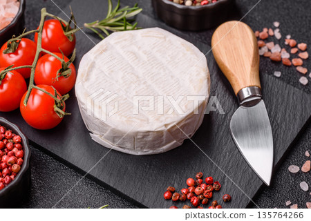 White French cream cheese Brie or Camembert for breakfast. Brie or Camembert cheese White French cream cheese Brie or Camembert for breakfast. Brie or Camembert cheese 135764266