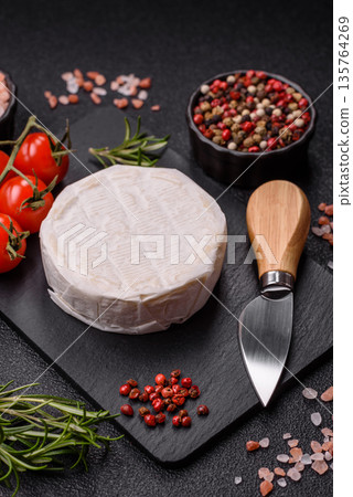 White French cream cheese Brie or Camembert for breakfast. Brie or Camembert cheese White French cream cheese Brie or Camembert for breakfast. Brie or Camembert cheese 135764269