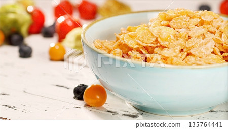 Stylized Presentation Of Wholesome Breakfast With Crisp Cereal And Ripe Berries On Rustic Table Stylized Presentation Of Wholesome Breakfast With Crisp Cereal And Ripe Berries On Rustic Table 135764441