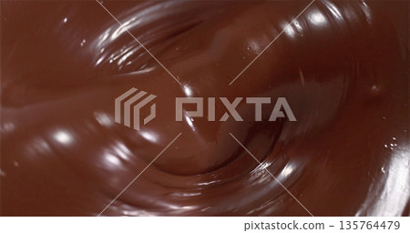 Closeup Of Luscious Dark Chocolate Swirl, Indulgent Melted Dark Chocolate With Glossy Finish Detail Closeup Of Luscious Dark Chocolate Swirl, Indulgent Melted Dark Chocolate With Glossy Finish Detail 135764479