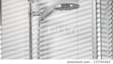 Serene Bathroom With Rainfall Shower, Minimalist Spa Setting Highlighting Ecofriendly Fixtures Serene Bathroom With Rainfall Shower, Minimalist Spa Setting Highlighting Ecofriendly Fixtures 135764483