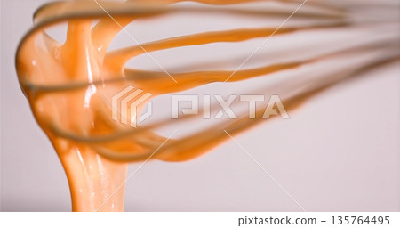 Closeup Of Viscous Caramel On Utensils, Handcrafted Caramel Glaze Captured In Vibrant Food Photography Closeup Of Viscous Caramel On Utensils, Handcrafted Caramel Glaze Captured In Vibrant Food Photography 135764495