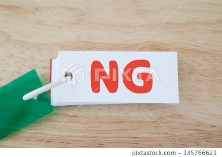 一張警告卡片的圖片,上面用紅色寫著「NG」字樣。 一張警告卡片的圖片,上面用紅色寫著「NG」字樣。 135766621