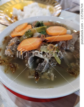 This is tradional food from Indonesia named sop iga This is tradional food from Indonesia named sop iga 135766744