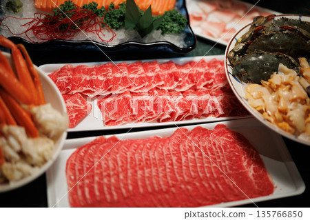 Assortment of Fresh Seafood and Sliced Meats 135766850