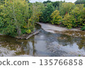 Autumn River Bend with Changing Foliage 135766858