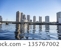 Tsukuda Ohashi Bridge and high-rise condominiums over the Sumida River 135767002