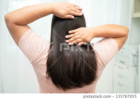 Woman with beautiful shine hair care treatment. Woman with beautiful shine hair care treatment. 135767855