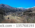 Shirakawago of early spring where snow remains 135768193