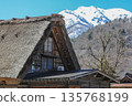 Shirakawago of early spring where snow remains 135768199