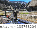 Shirakawago of early spring where snow remains 135768204