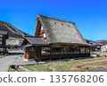 Shirakawago of early spring where snow remains 135768206