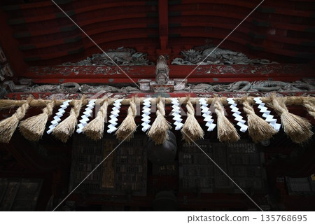 Paper streamers and sacred ropes at shrines 135768695