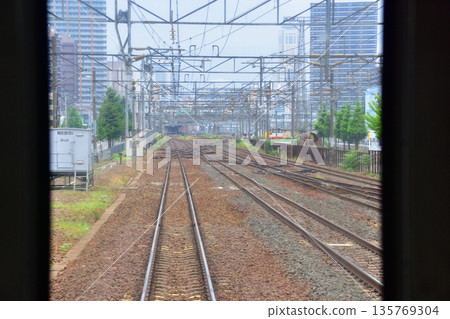 JR Hokkaido Hakodate Main Line: Scenery from the window of a local train from Shinrin-koen Station to Sapporo Station (cloudy summer 2023) 135769304